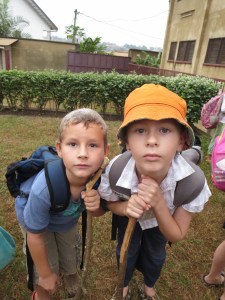 Pretending to be 100 years old, these grade 2 students need a cane.
