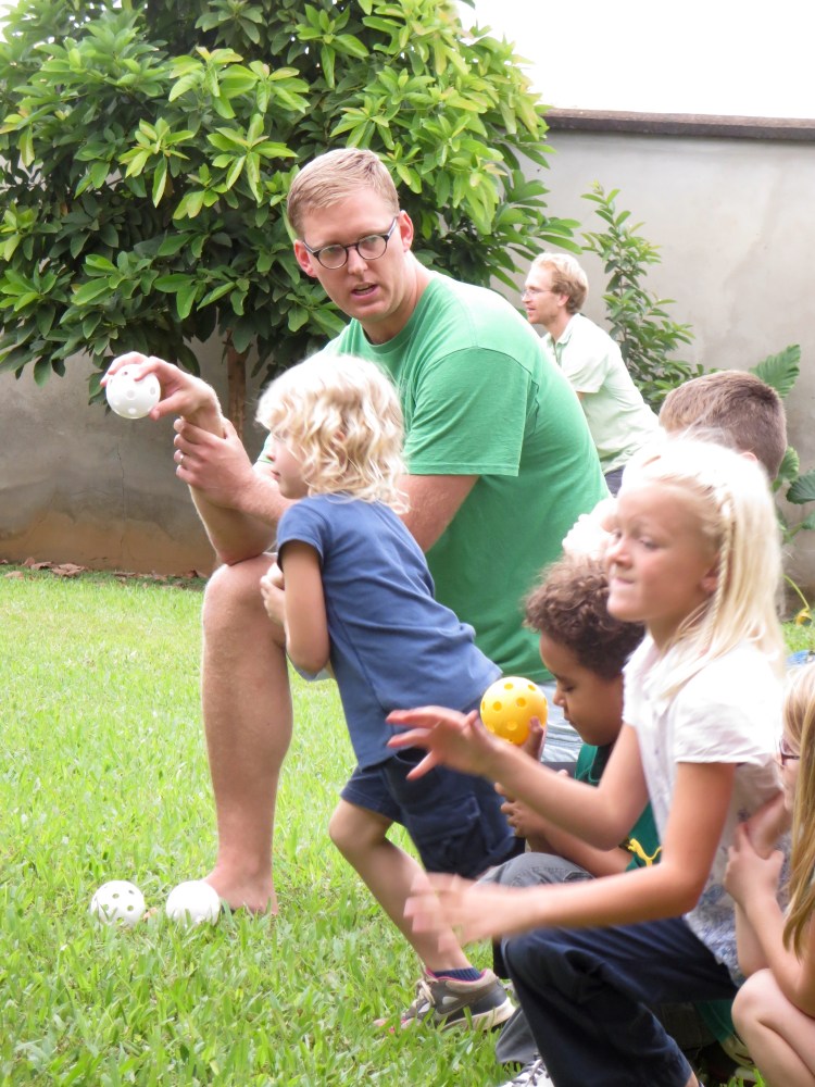 Practicing the right wrist action for throwing.
