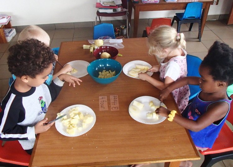 Cutting apples to go into the pie!
